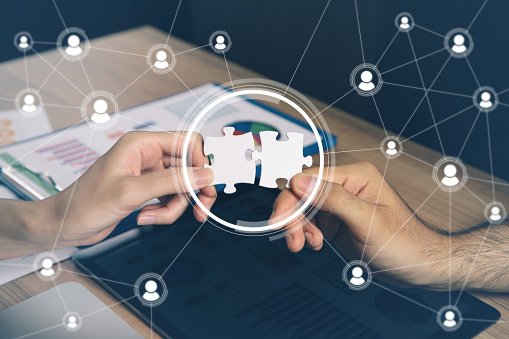 Men Holding Pieces of Jigsaw Puzzle